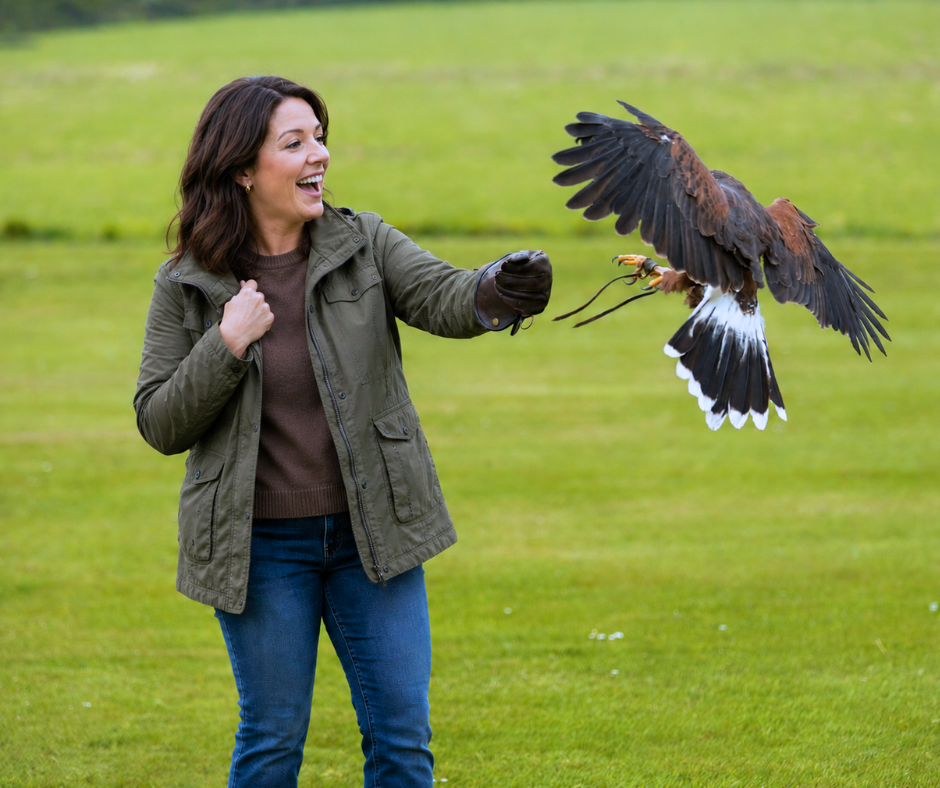 Event attendee participating in falconry