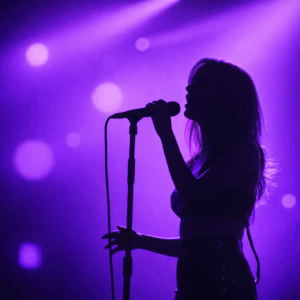 backlit singer with purple lights to demonstrate color psychology