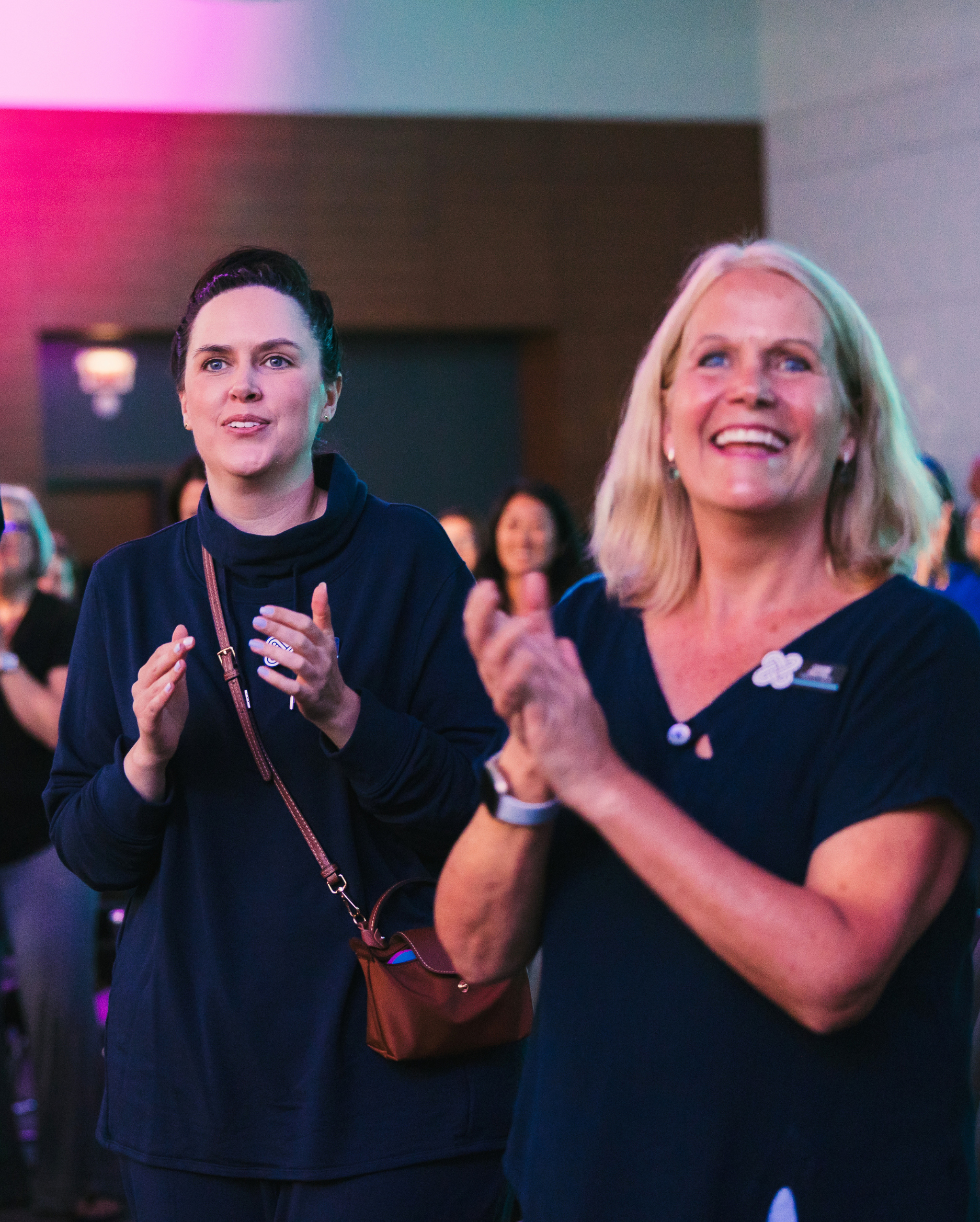 Creative Group team members cheering one another on