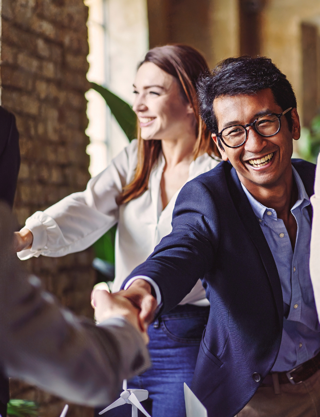 sales meeting meet and greet with people reaching out to shake hands